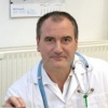 Dr. Simon Attila
