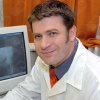 Dr. Gunther Tibor